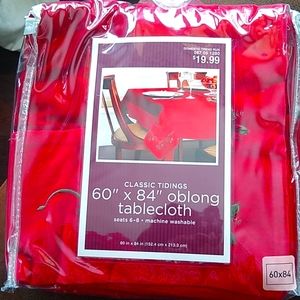 Two 60"x80" oblong Christmas table cloths
